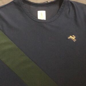 Tracksmith Van Cordtland green-on-navy shirt